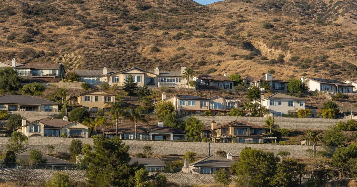 Terraced hillside homes on graded pads below the Santa Susana hills in Simi Valley